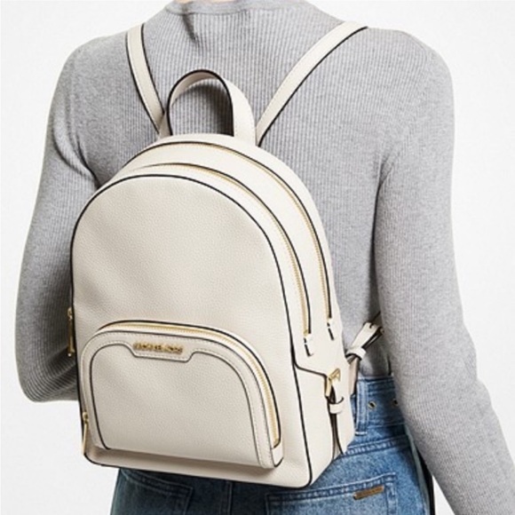 Michael Kors Handbags - Michael Kors Jaycee Medium
Pebbled Leather Backpack Light
Cream